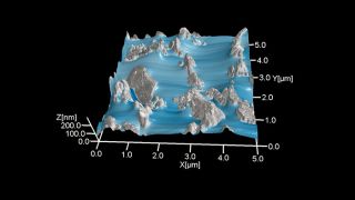 Partially mixed and partially cured two component epoxy. The phase image data is overlaid on the 3D topography.